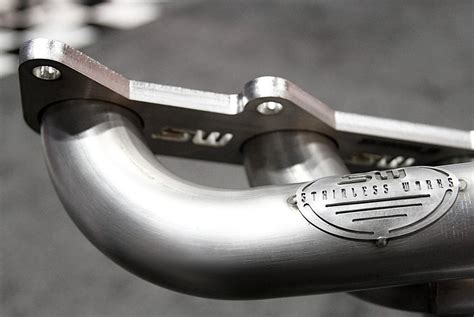 Stainless works headers - Description. Chevy, Small Block Up and Forward Turbo Headers. All tubes are CNC mandrel bent for optimal flow. Made from 304 stainless steel for maximum corrosion resistance. Starting with a CNC cut 3/8" thick flanges into 1-7/8" diameter primaries, flow into 3" slip-fit collectors. Headers are fully TIG welded and back purged.
